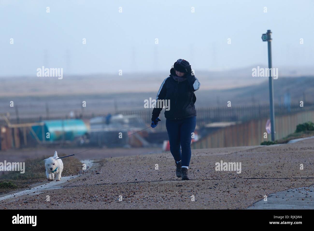 Struggling with wind hi-res stock photography and images - Alamy