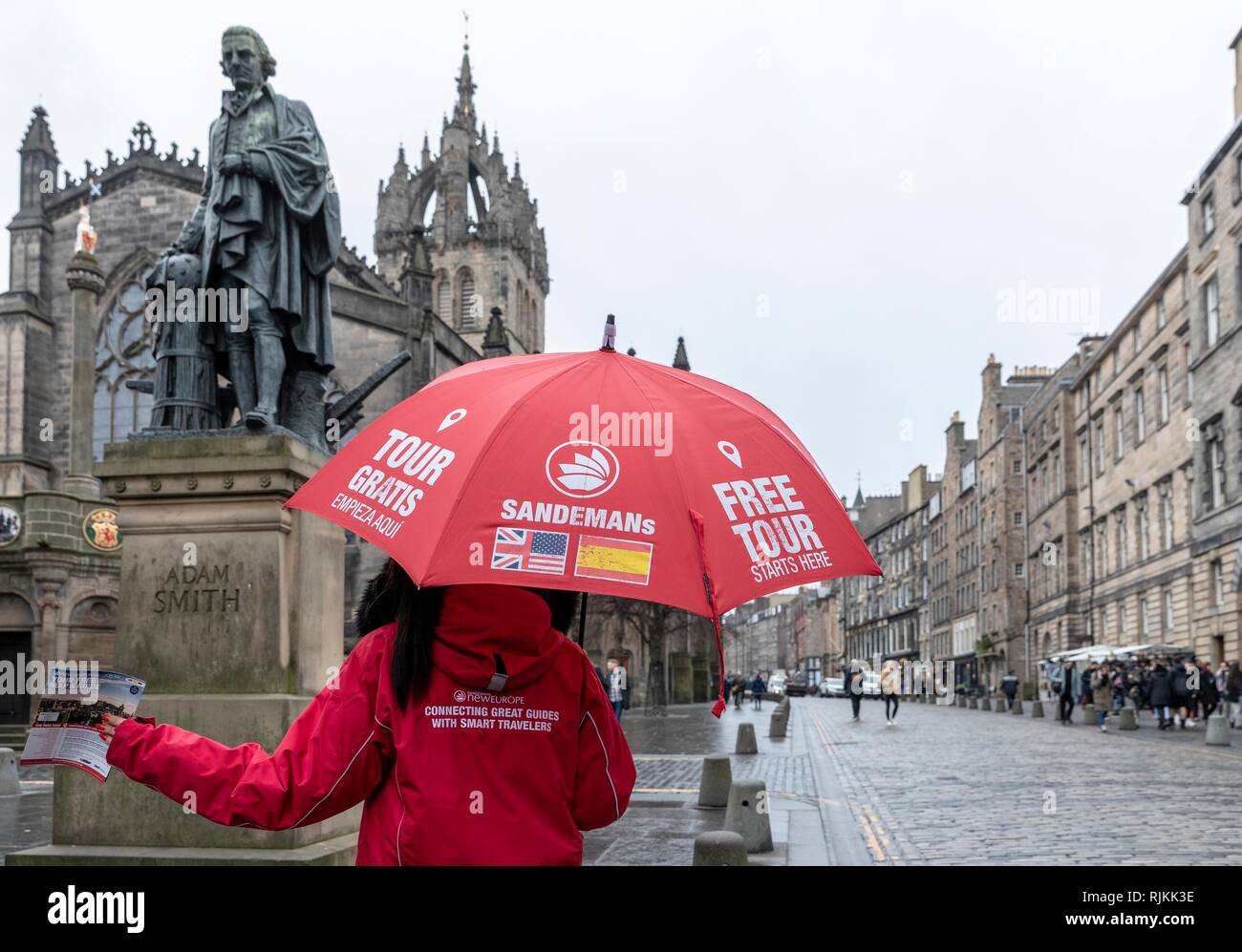 Edinburgh, UK. 07th Feb, 2019. Councillors in Scotland's capital city, Edinburgh, vote on proposals to introduce a tourist tax of £2 per person, per night. The proposals, if approved, will also need legislative change by the Scottish Government which was signalled in the recent Budget. Pictured: One of the many Free Tours sellers on Edinburgh's Royal Mile under a statue of free-market economist, Adam Smith Credit: Rich Dyson/Alamy Live News Stock Photo
