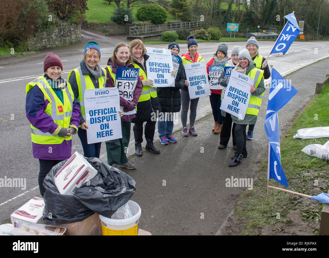 Irish nurses taking industrial action on a picket line over pay claim Stock Photo