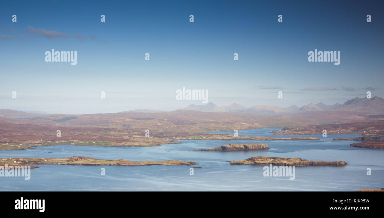 Beautiful autumn landscape on Isle of Skye with Atlantic Ocean, Cuillin Hills, Harlosh Peninsula, Loch Bracadale - view from the top of MacLeod's Tabl Stock Photo