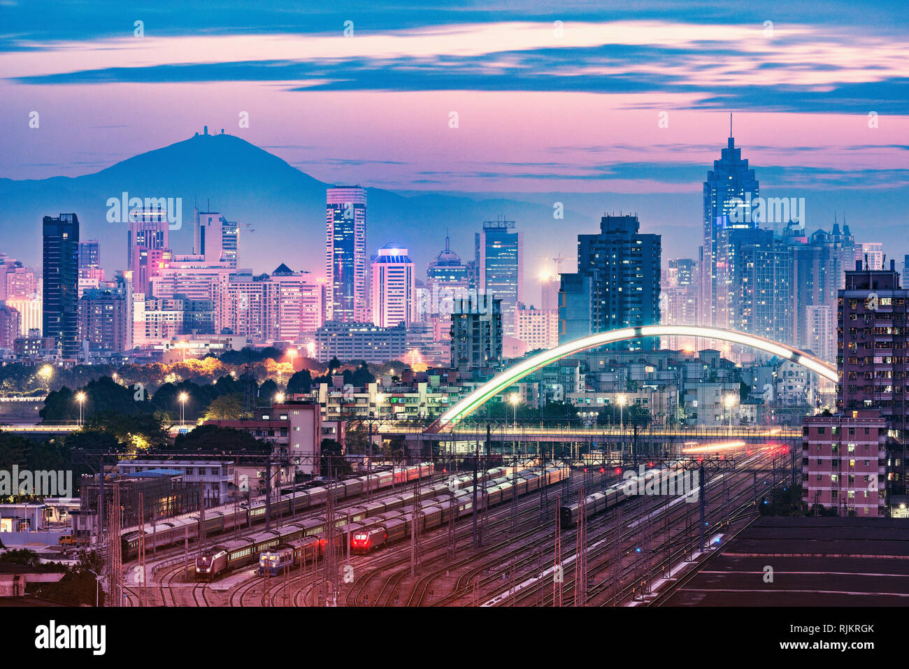 Cityscape and railway station at evening time. Shenzhen. China 