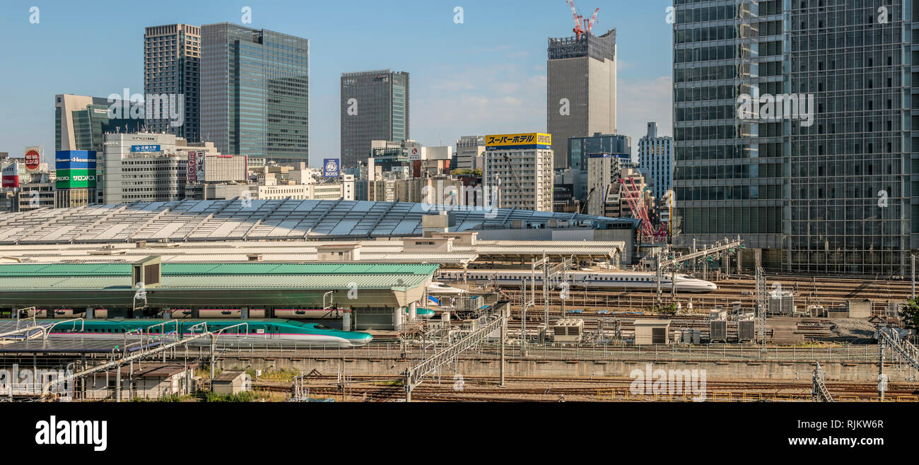 Shinkansen hub at Tokyo Central Station and the Marunouchi skyline, Tokyo, Japan Stock Photo