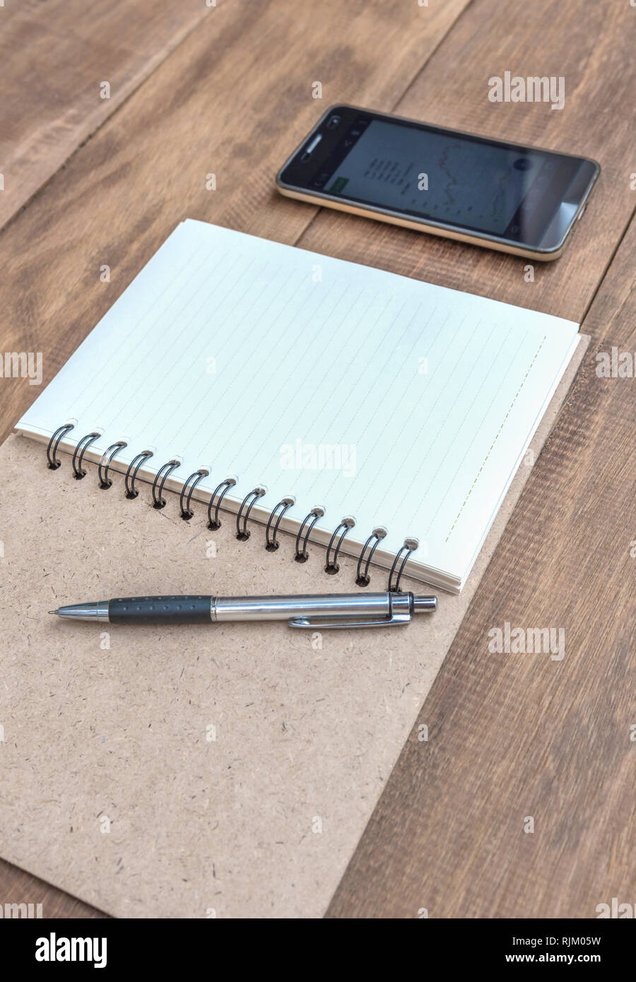 Notebook Open. Phone Mobile phone blank paper hi-res stock photography and images - Alamy