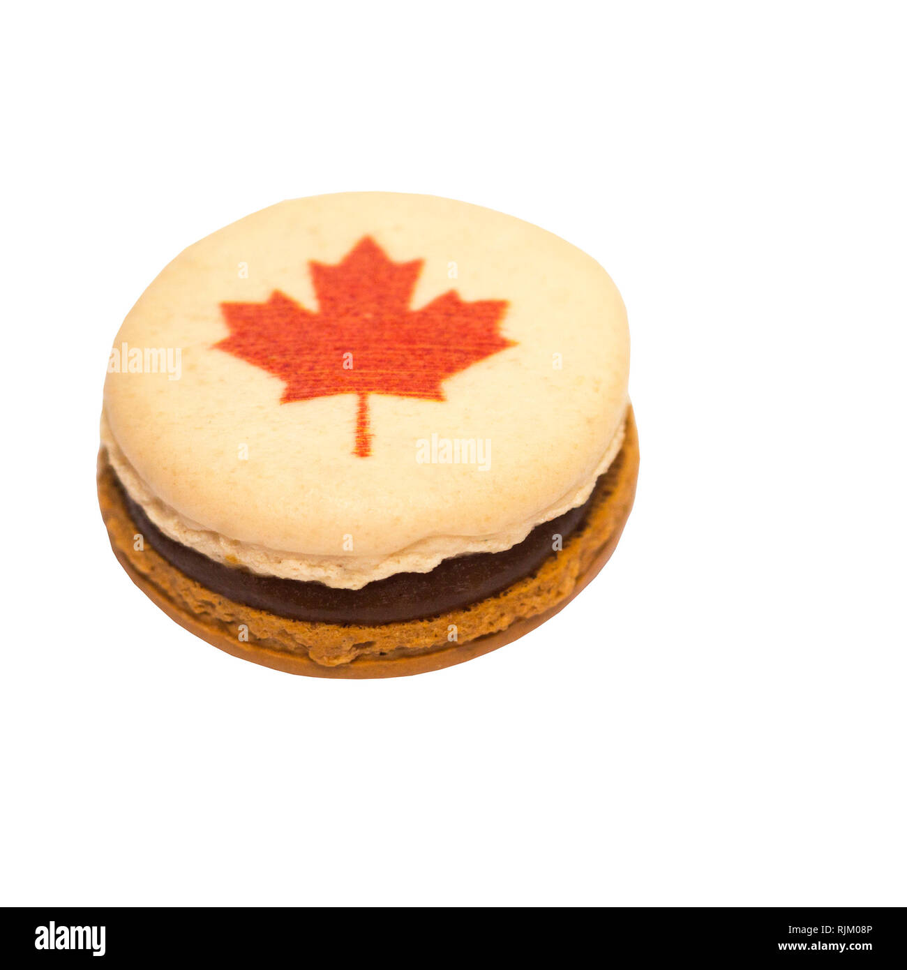 Macaron decorated with red maple leaf made for Canada Day Stock Photo