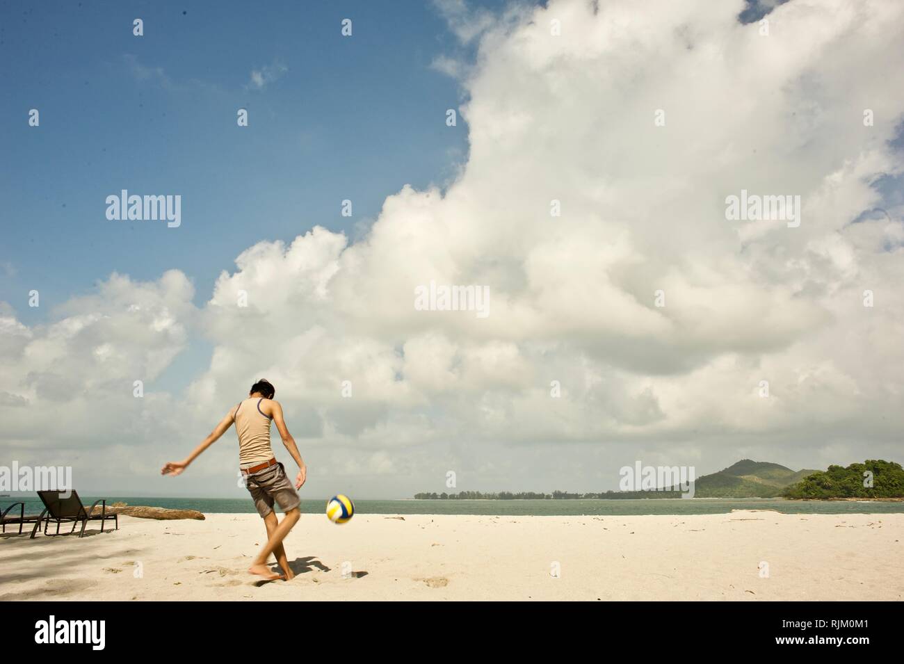 spectacular kick by the beach Stock Photo