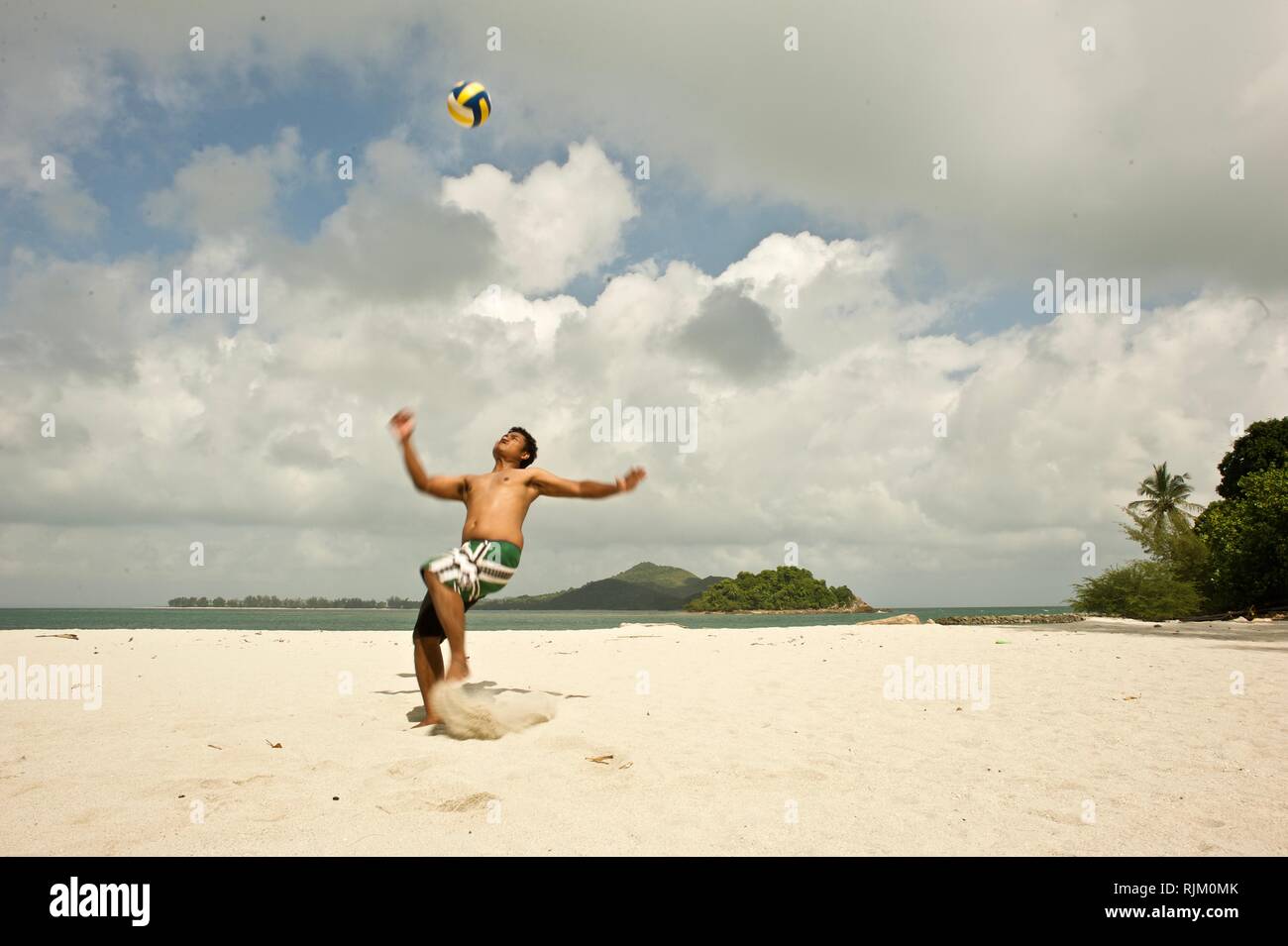 spectacular kick by the beach Stock Photo