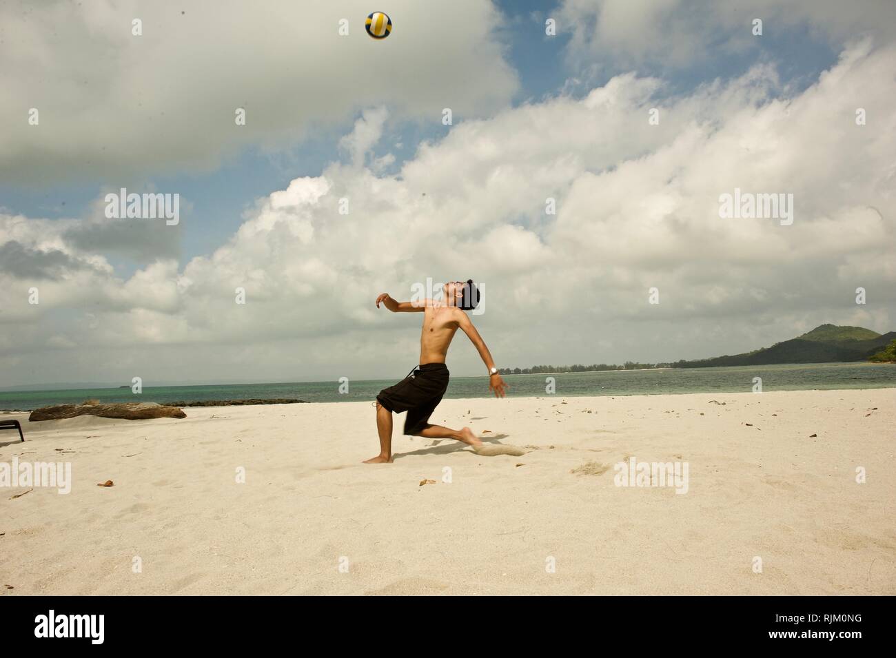 spectacular kick by the beach Stock Photo