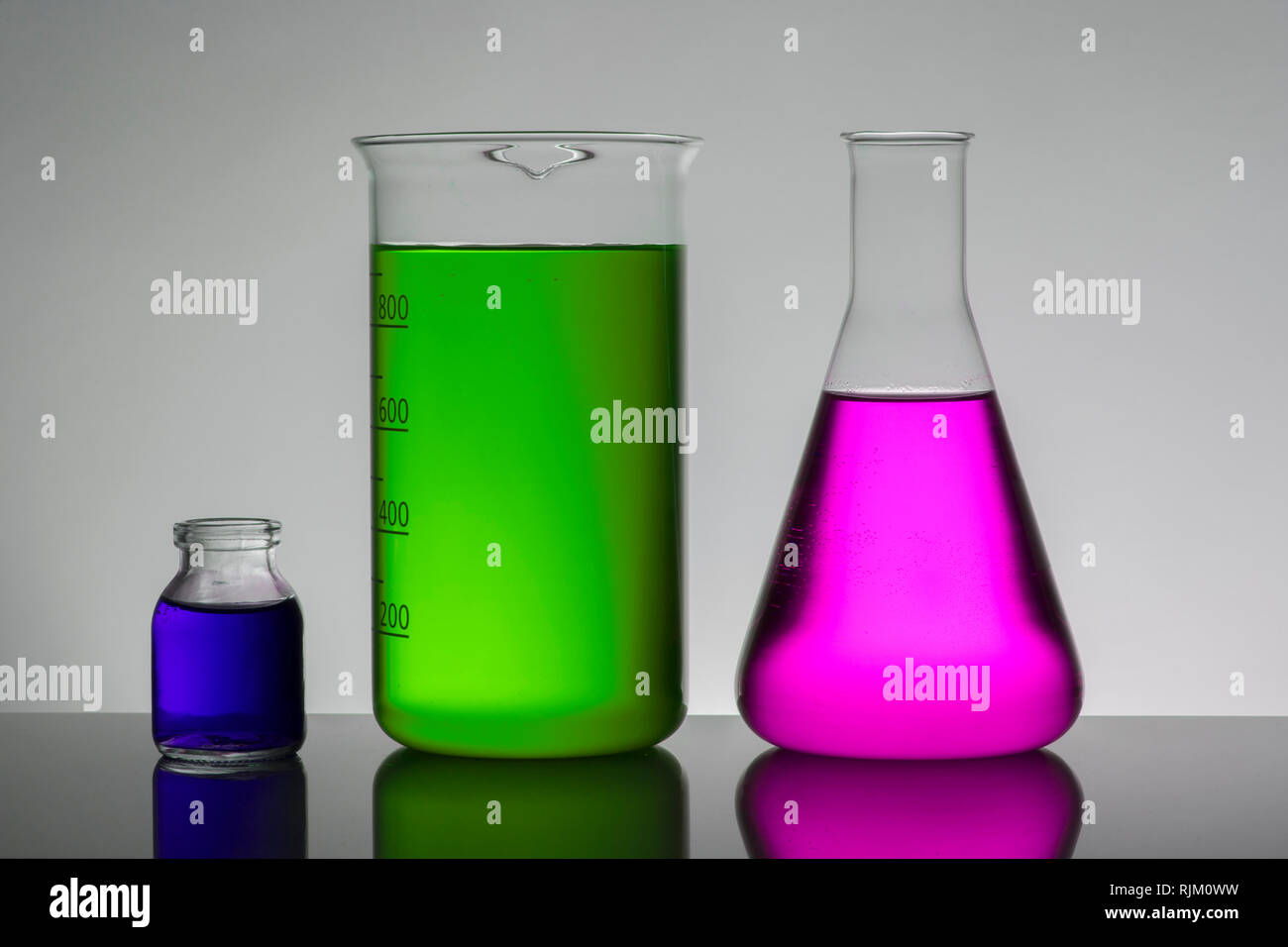 Liquid in laboratory bottles. Scientific biochemical laboratory ...