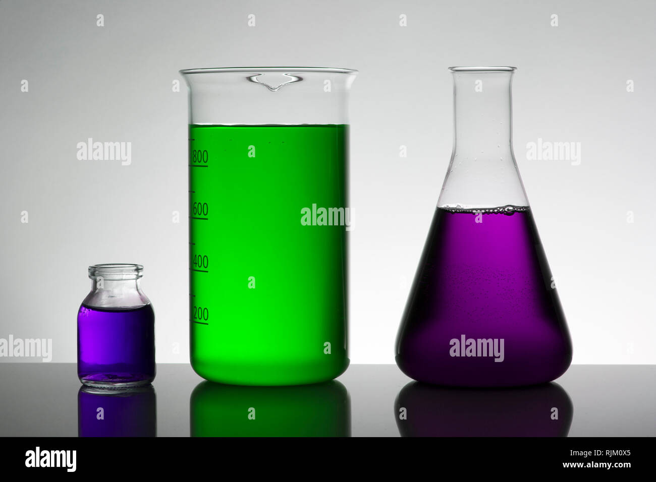 Liquid in laboratory bottles. Scientific biochemical laboratory ...