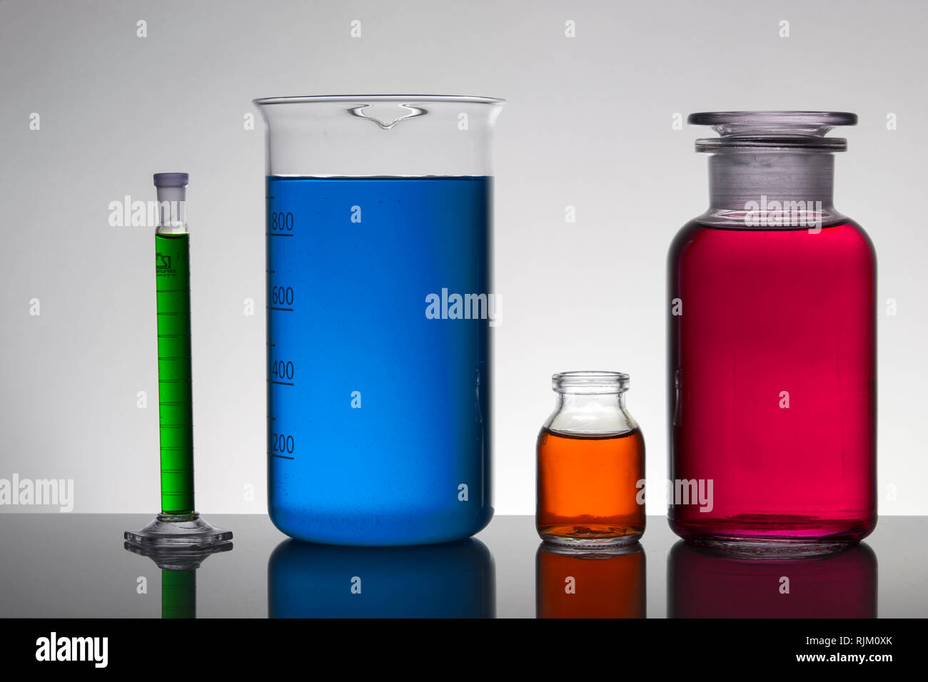 Liquid in laboratory bottles. Scientific biochemical laboratory ...