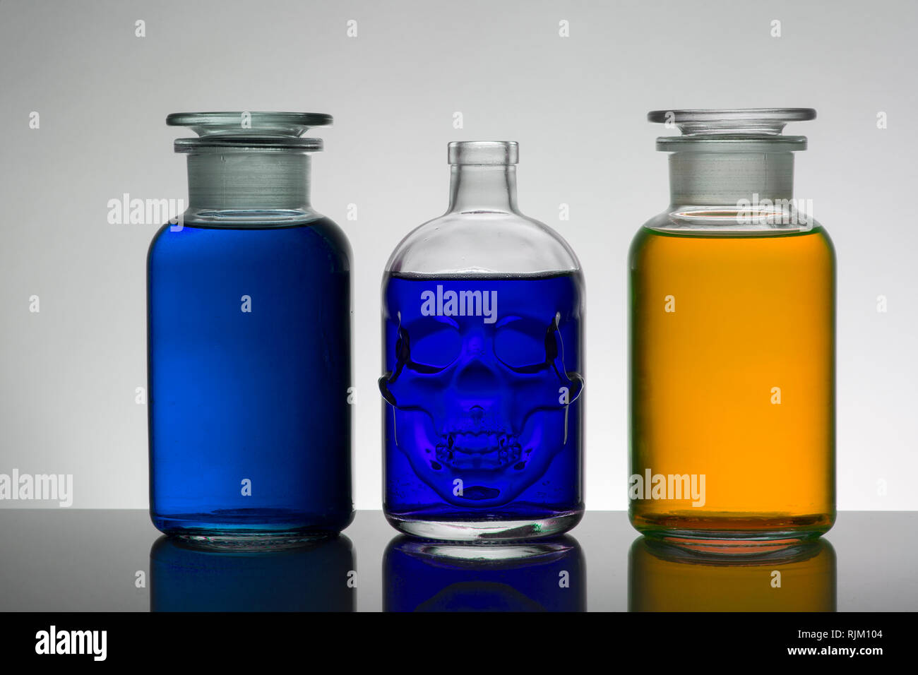 Liquid in laboratory bottles. Scientific biochemical laboratory ...