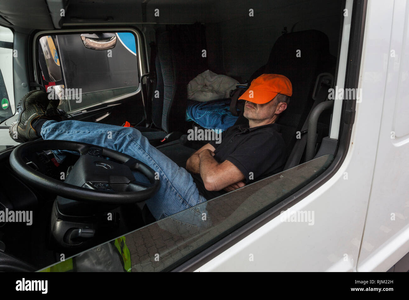 Sleeping in truck hi-res stock photography and images - Alamy