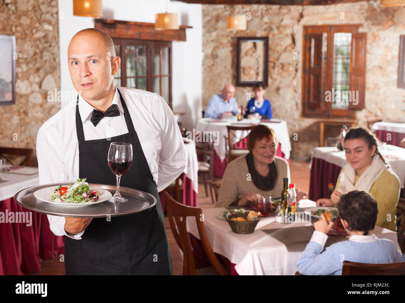 Waiter demonstrating tray dish hi-res stock photography and images - Alamy