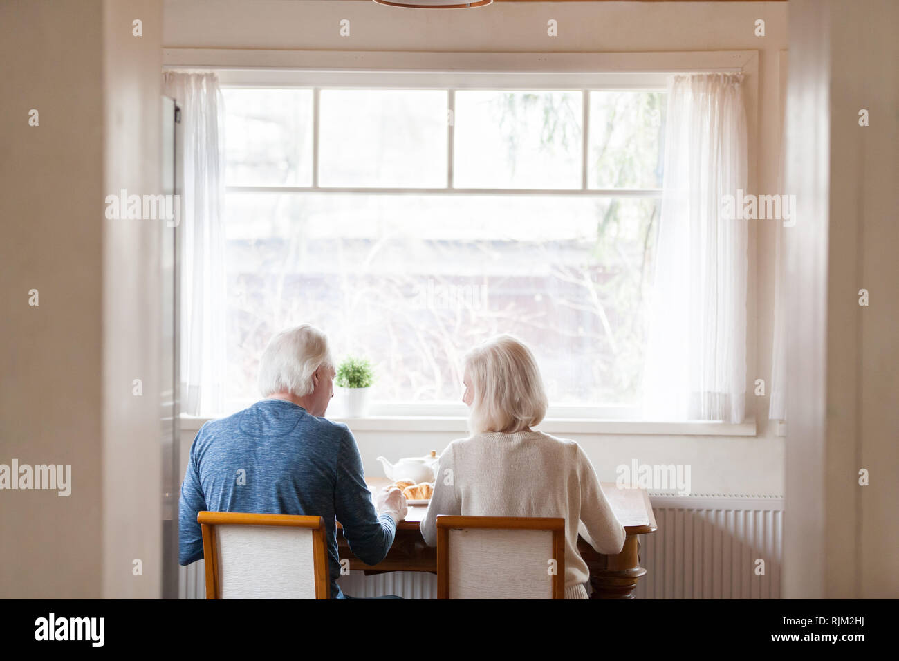 Back view sitting room hi-res stock photography and images - Alamy