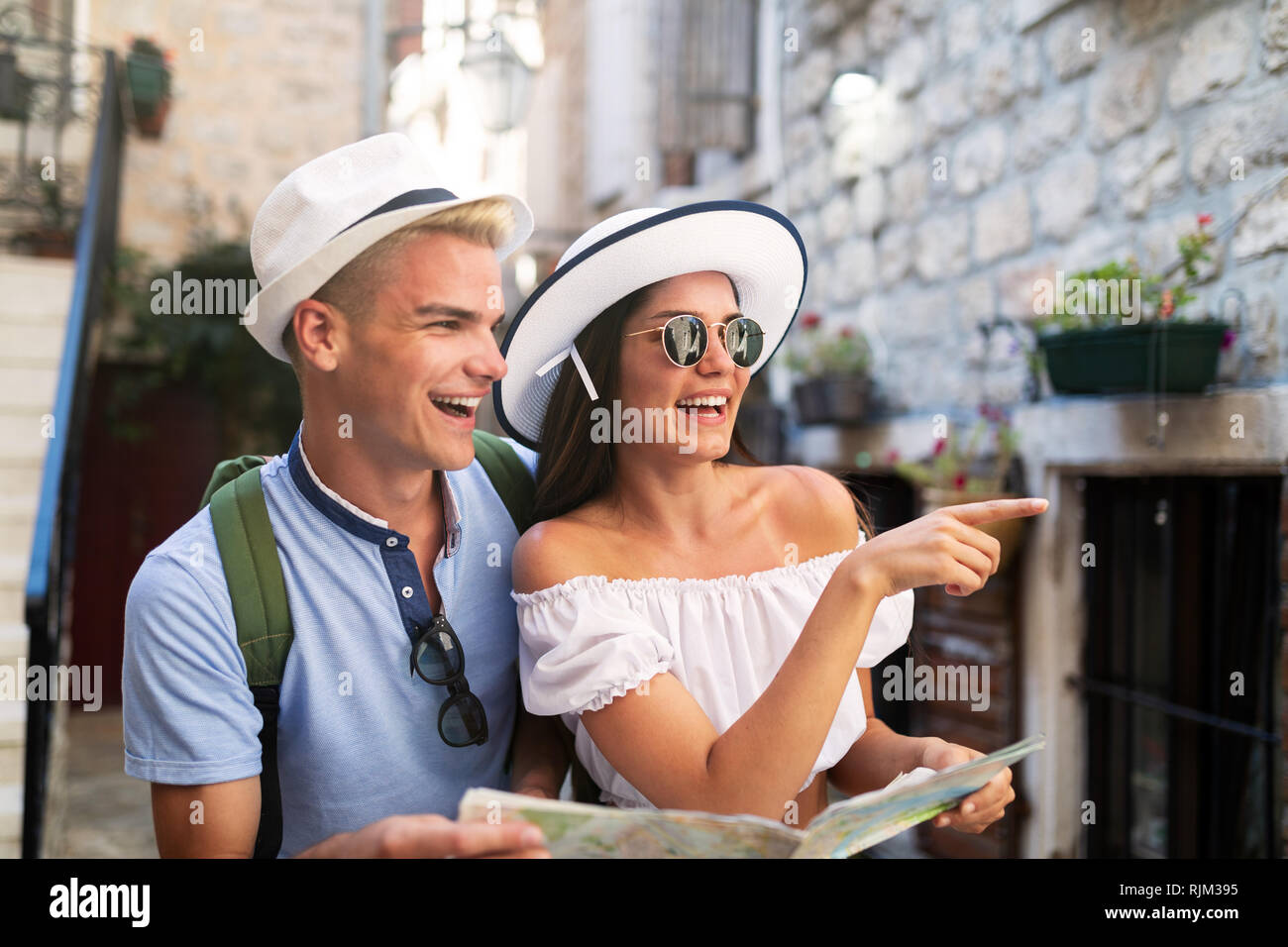 Happy lovely couple enjoying traveling and vacation Stock Photo
