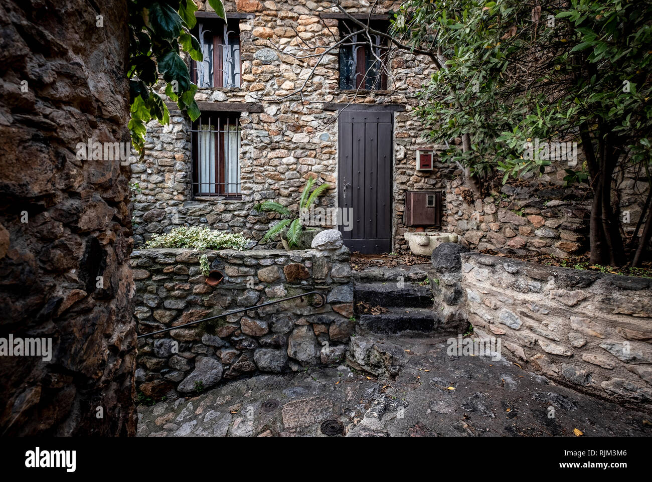 Rustic architecture in the village of Castelnou, within the list of Les plus beaux towns of France Stock Photo