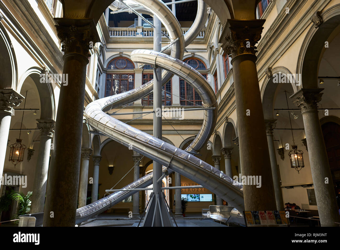 The Florence Experiment by German artist Carsten Hölleris two giant spiraling slides the installation researches the emotional link between people and Stock Photo