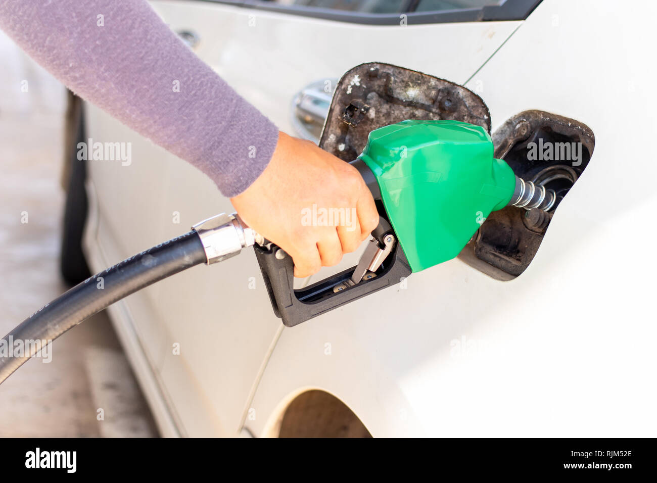 Blue color fuel pump gun hi-res stock photography and images - Alamy