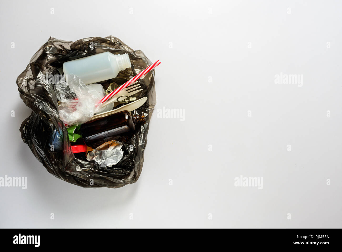 Unsorted Garbage in plastic bag. Recycle concept Stock Photo