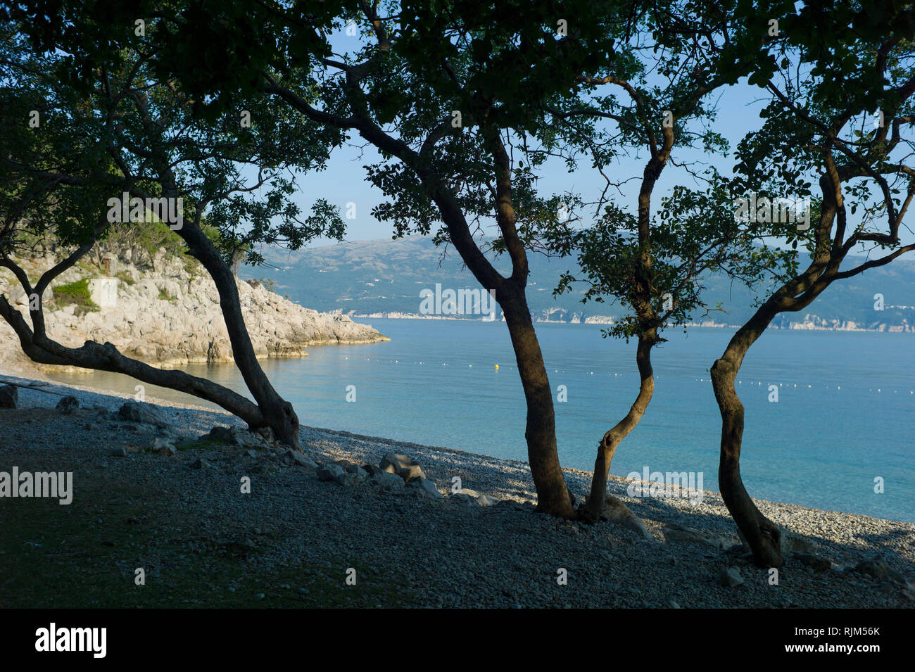 The beach at Porozina village at the north end of the island of Cres ...