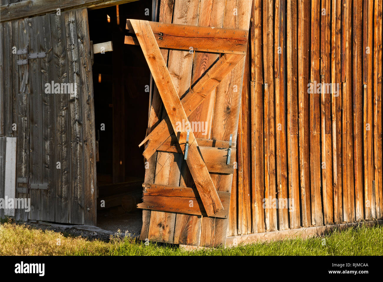 WY03327-00...WYOMING - Broken door at historic barn on Mormon Row in Grand Teton National Park. Stock Photo