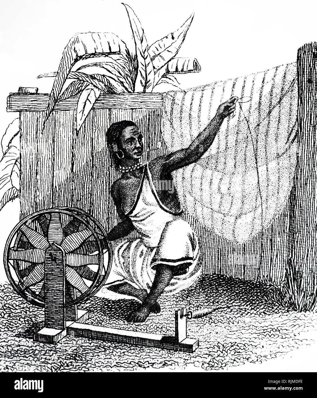 Illustration showing Indian Hindu woman spinning cotton 1822 Stock Photo Alamy