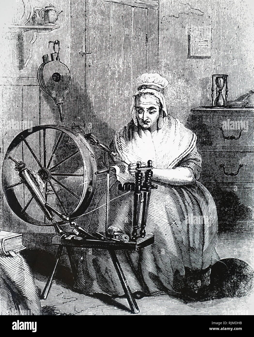 Illustration showing Saxony spinning wheel. 1851 Stock Photo