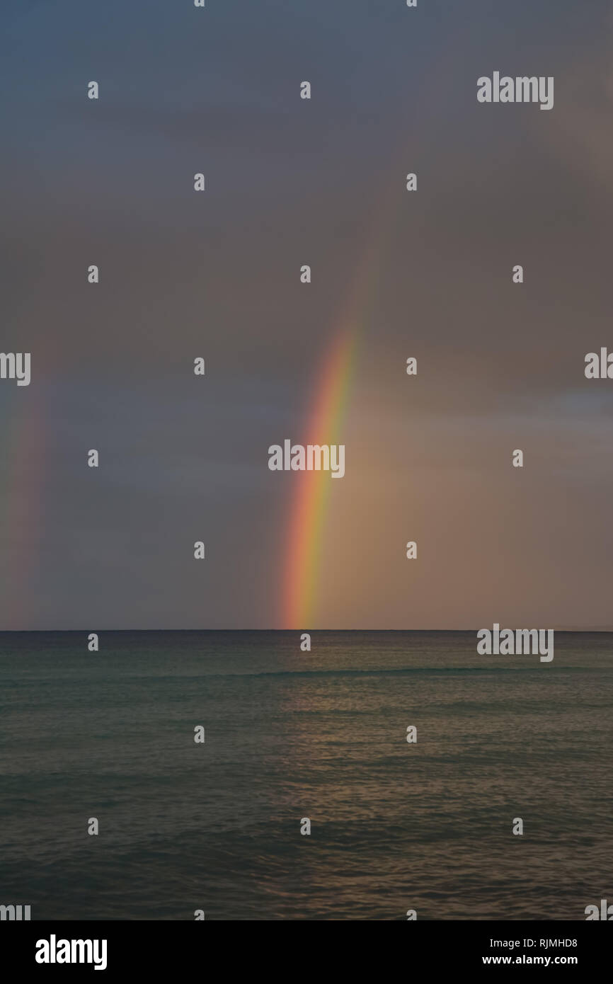 Blue sky with clouds on horizon and rainbow background hi-res stock ...