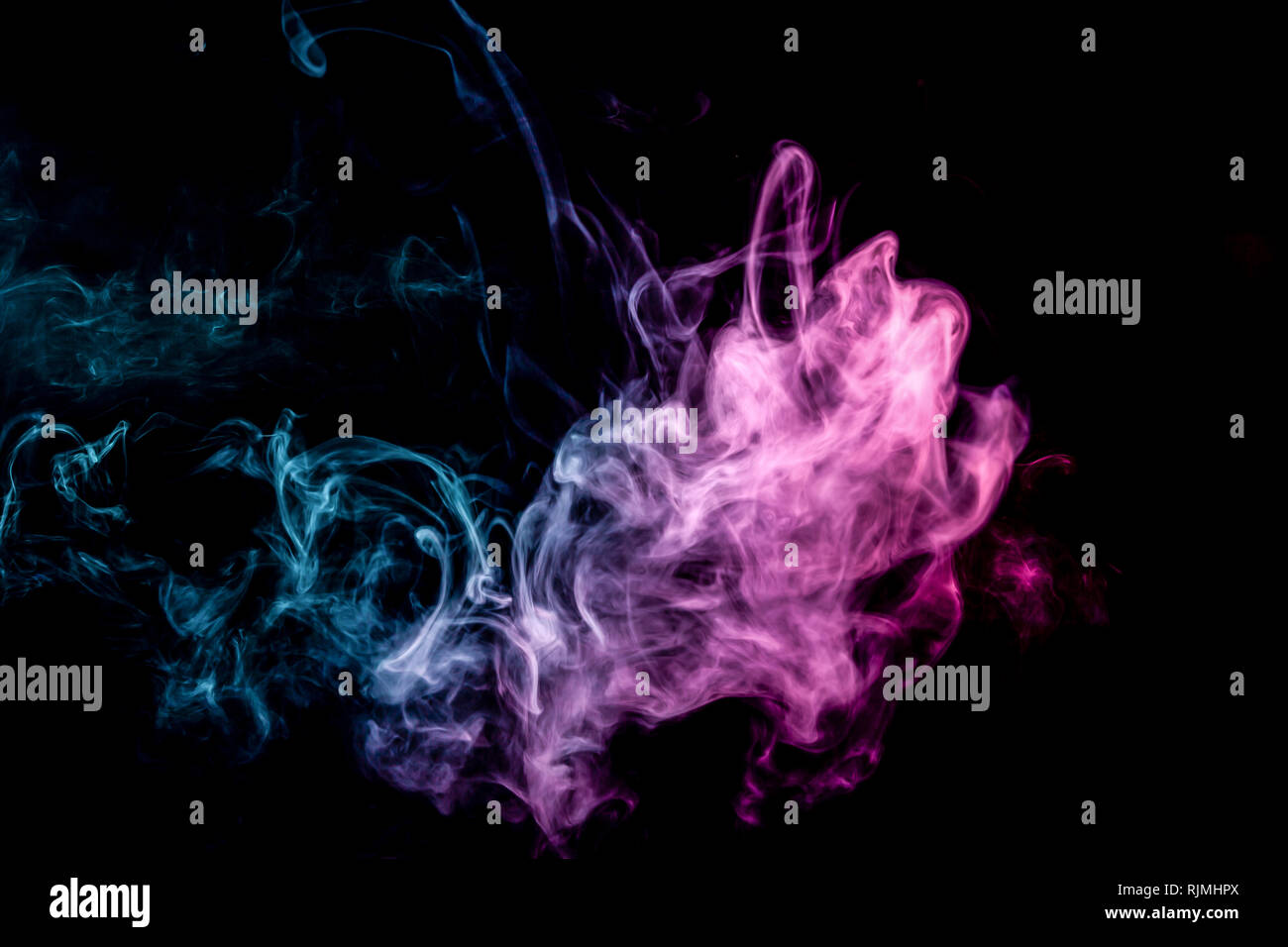 Frozen abstract movement of explosion smoke multiple blue and pink ...