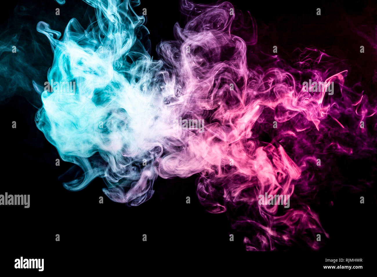 Cloud of pink and blue smoke on a black isolated background. Background ...