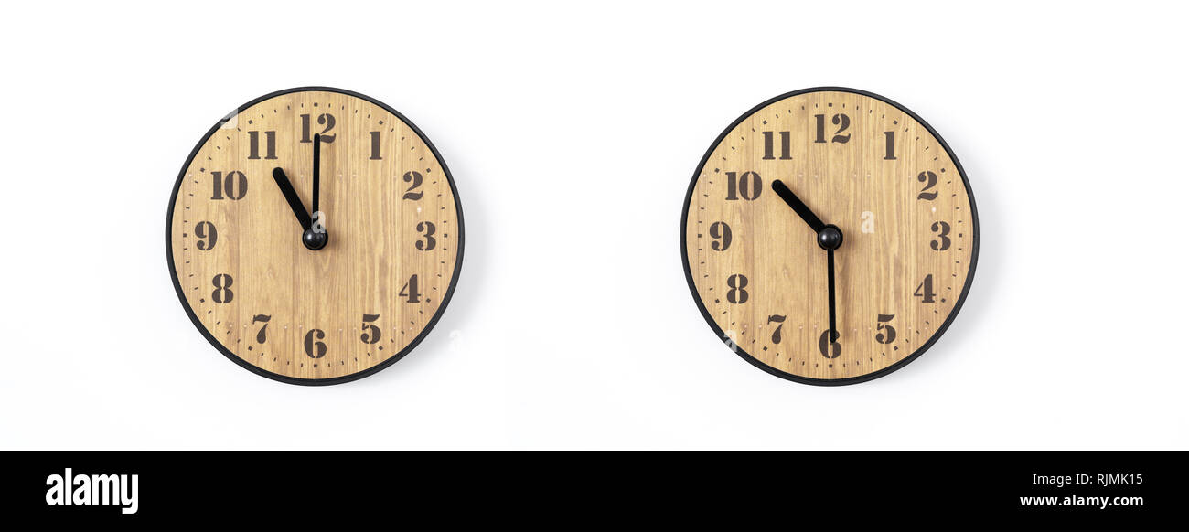 wood office wall clock with white dial on white background. wall clock on white background, top view. Stock Photo