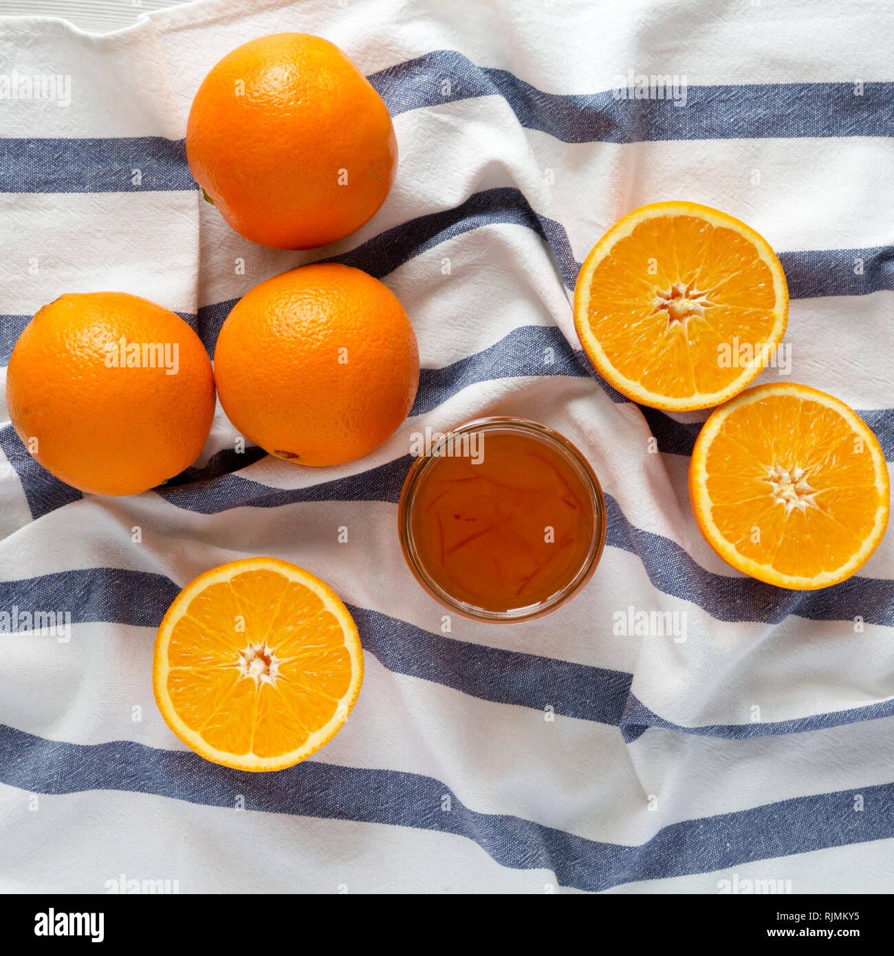 Homemade orange marmelade in glass jar, view from above. Flat lay, top ...