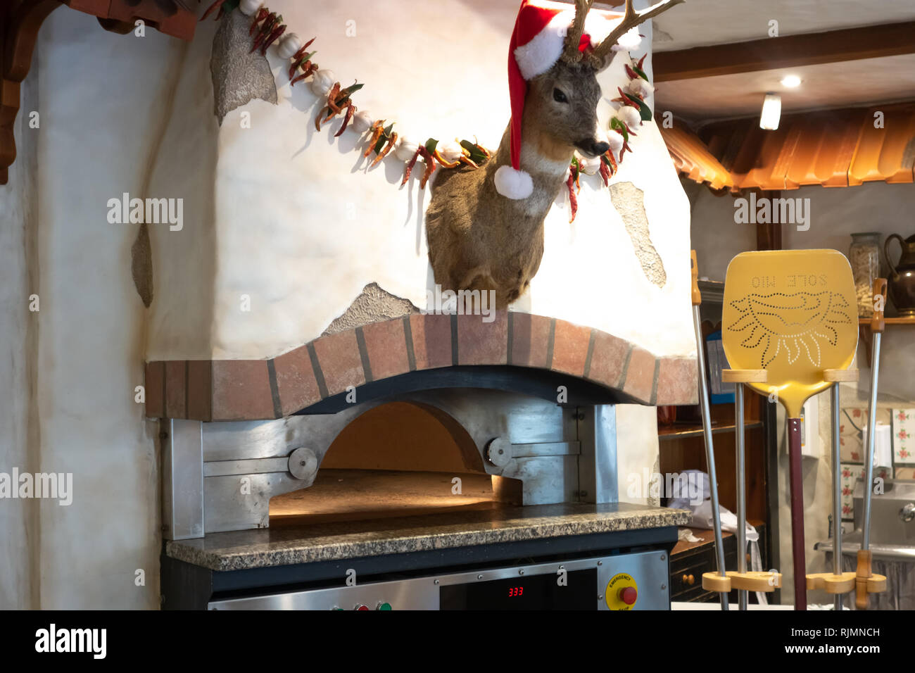 The pizza oven in the city cafe is ready for work Stock Photo