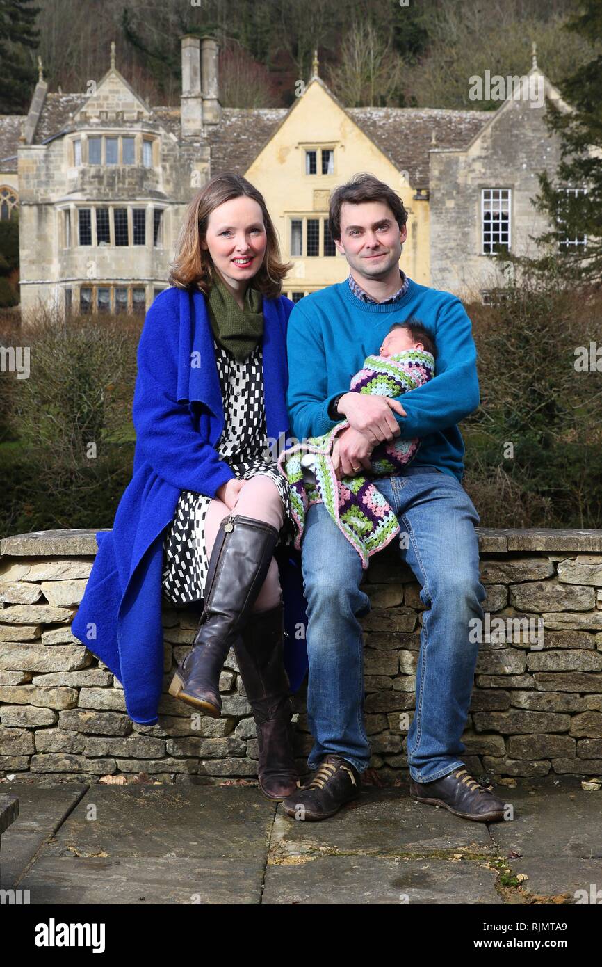 Ciara and Hugo Mander with baby Luna, at Owlpen Manor, their grade 1 listed Tudor country house in the village of Owlpen, near Stroud, Gloucestershire Stock Photo