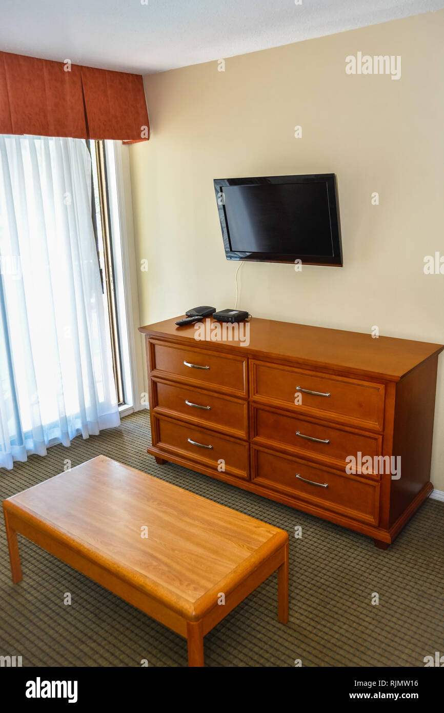 Corner Of The Living Room With Furniture And Tv Display On