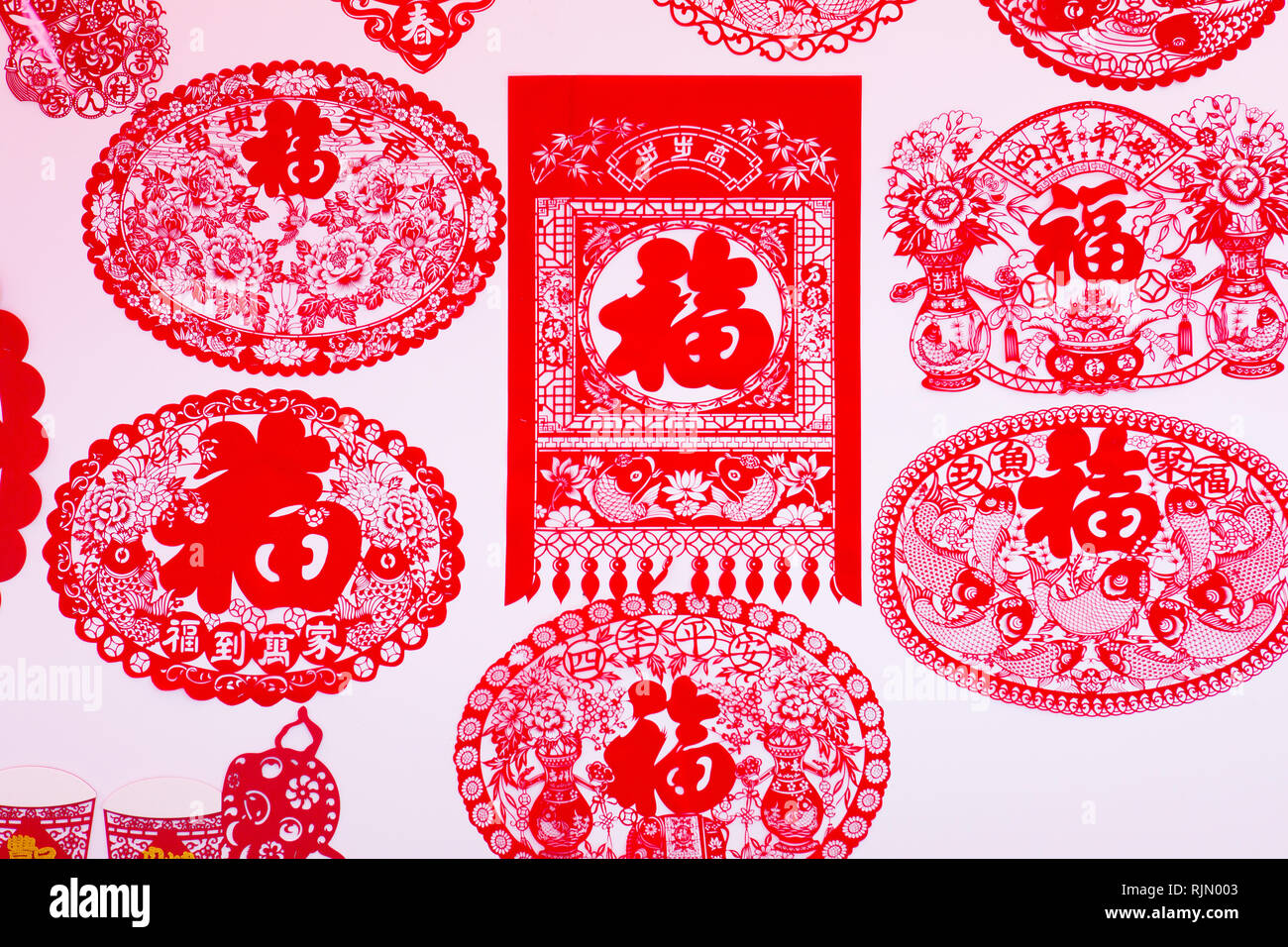 Chinese New Year decoration design with the Chinese character 福 (Fu) in it. A single character meanings of good fortune, happiness and luck. Stock Photo