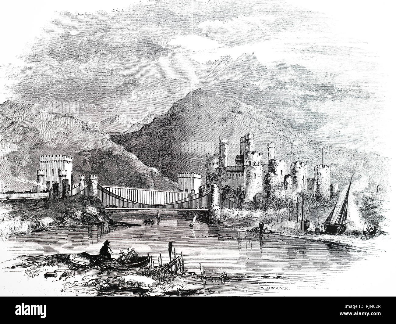 1860 Illustration, showing Conwy Castle with Telford's suspension bridge over the Conwy estuary, built 1822-26: in the background is Robert Stephenson's tubular bridge for the Chester-Holyhead Railway Stock Photo