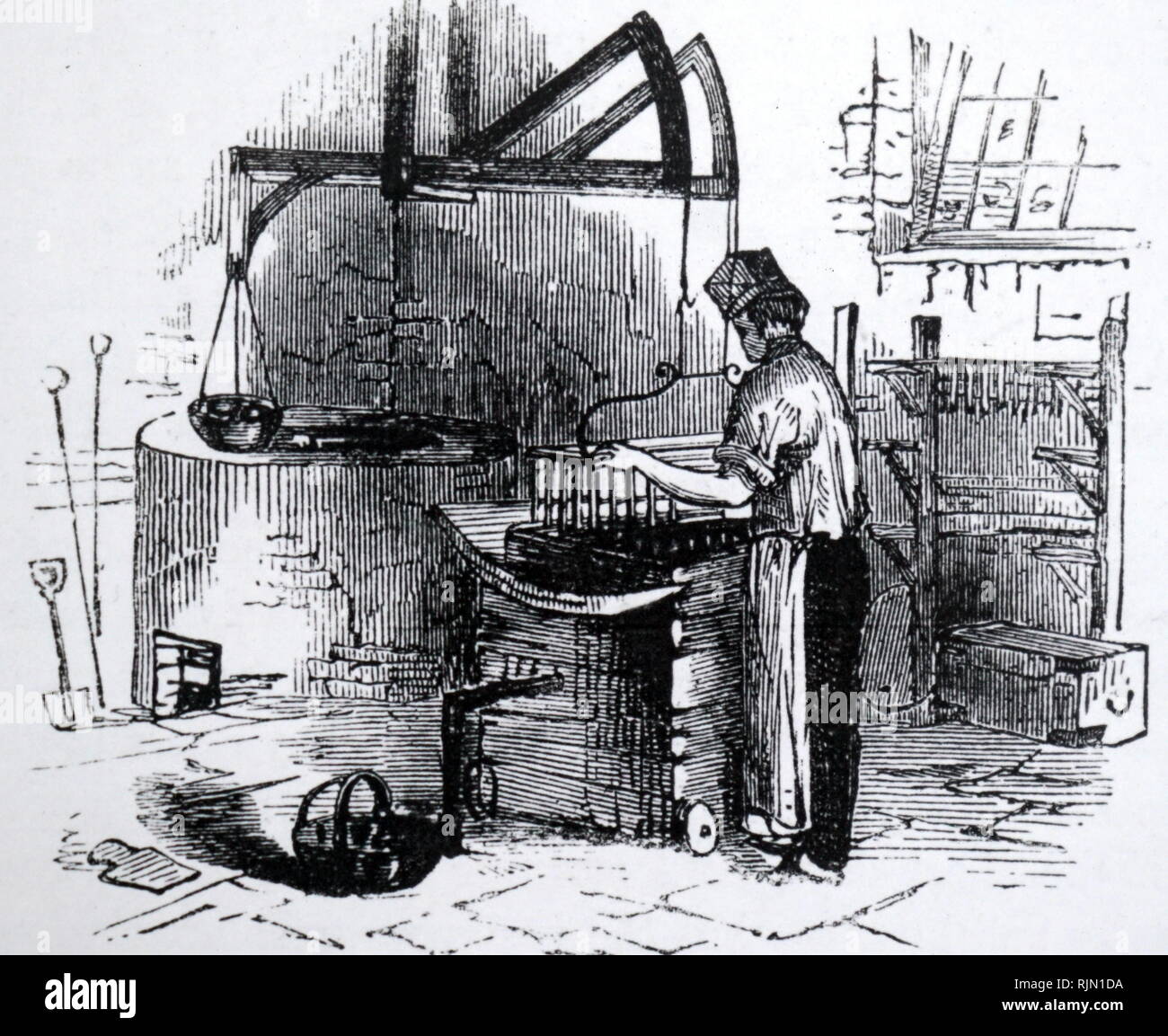 Illustration showing dipping TALLOW candles. A frame of broaches containing wicks is attached to a NODDING DONKEY - a balance shaped beam suspended from the ceiling with a pan containing counterbalance weights at one end. The weights in the pan determined the size of the candles being dipped. 1866 Stock Photo