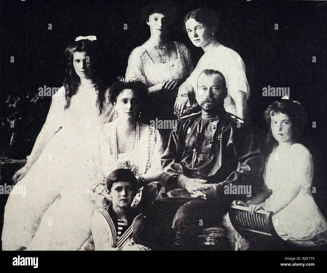 Russian imperial family (between circa 1913 and circa 1914). Tsar Nicholas II and Empress Alexandra with their children. Stock Photo