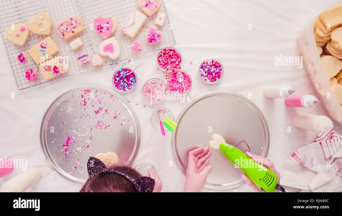 Flat lay. Step by step. Drying royal icing on sugar cookies with small