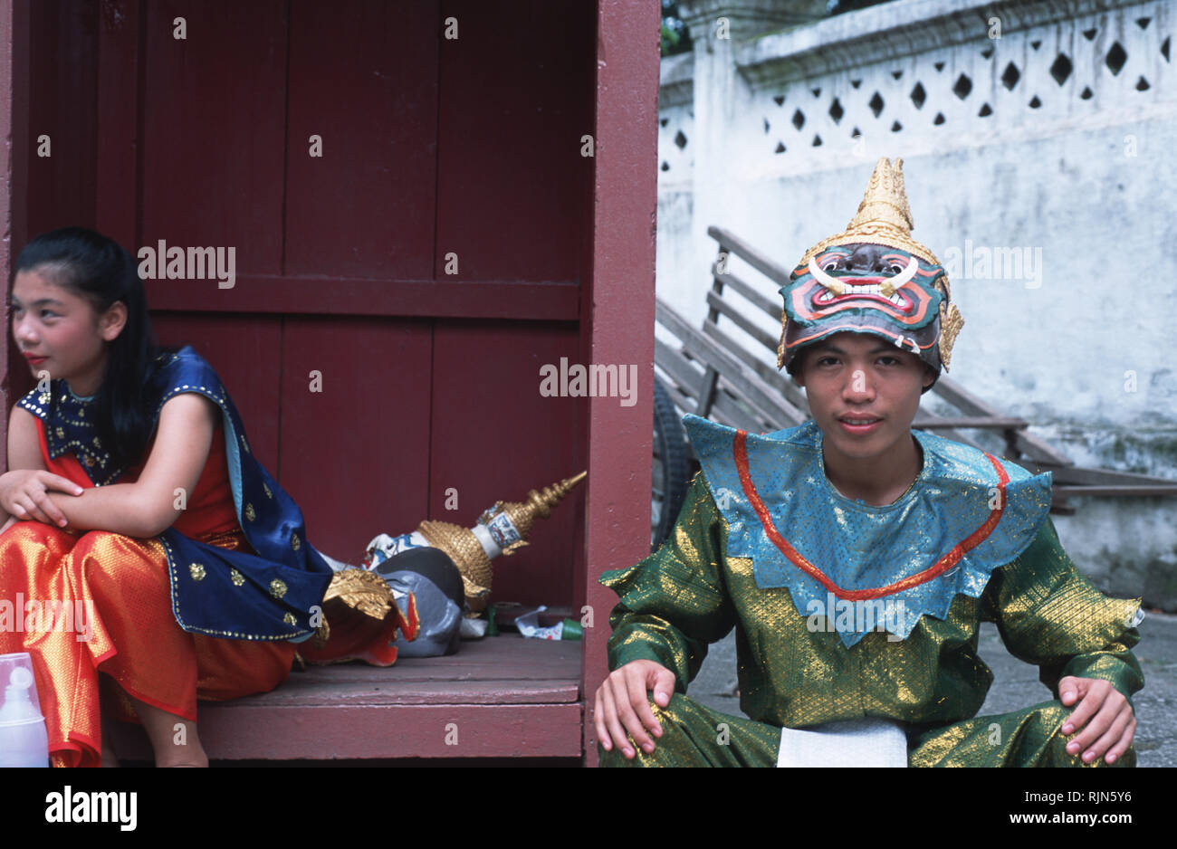 A young Laotian man dressed up to perform in a traditional theatre
