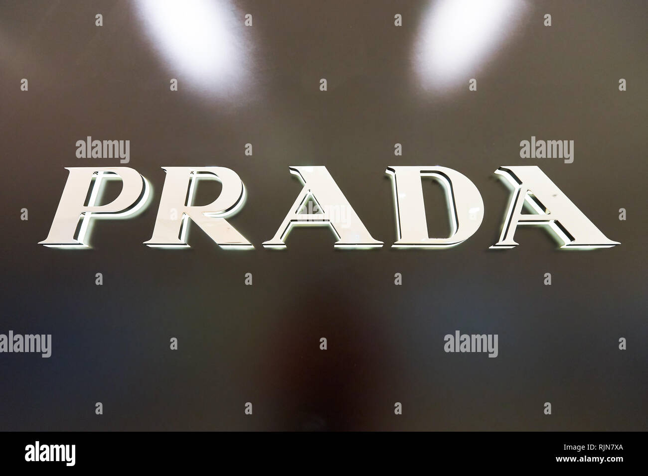 HONG KONG - JANUARY 27, 2016: Prada logo on the wall at Elements Shopping  Mall. Prada S.p.A. is an Italian luxury fashion house, founded in 1913 by Ma  Stock Photo - Alamy