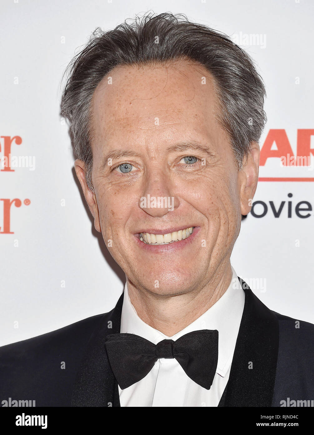 RICHARD E. GRANT at the 18th Annual AARP The Magazine's Movies For Grownups Awards at the Beverly Wilshire Four Seasons Hotel on February 04, 2019 in Beverly Hills, California.  Photo: Jeffrey Mayer Stock Photo