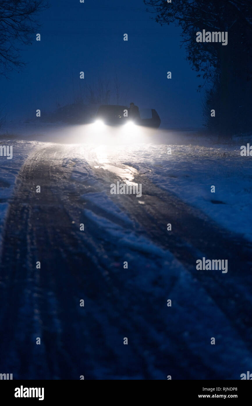 Car headlights night head on hi-res stock photography and images - Alamy