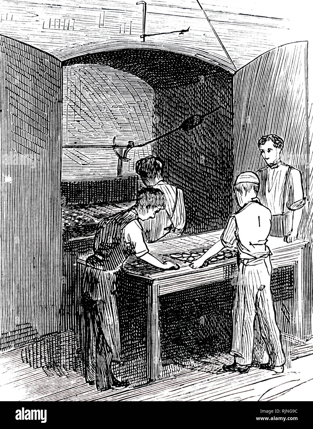 An engraving depicting biscuits going into the oven at Peek, Frean & Co.'s biscuit factory, Southwark Park, London. Dated 19th century Stock Photo