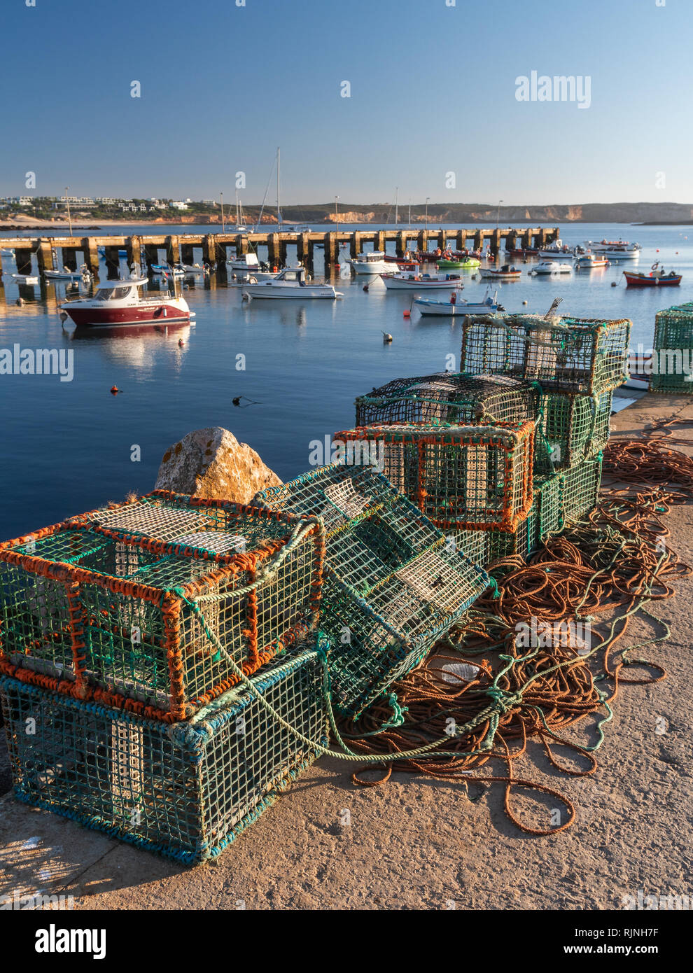 fisherman fishing net on the docks Stock Photo