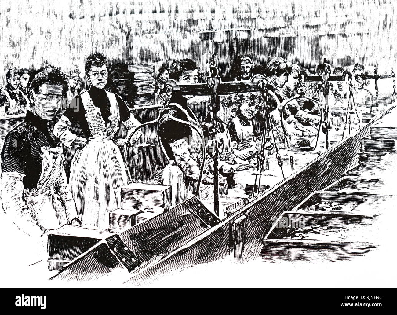 An engraving depicting women packing biscuits at the Huntley & Palmer's factory, Reading. Dated 19th century Stock Photo