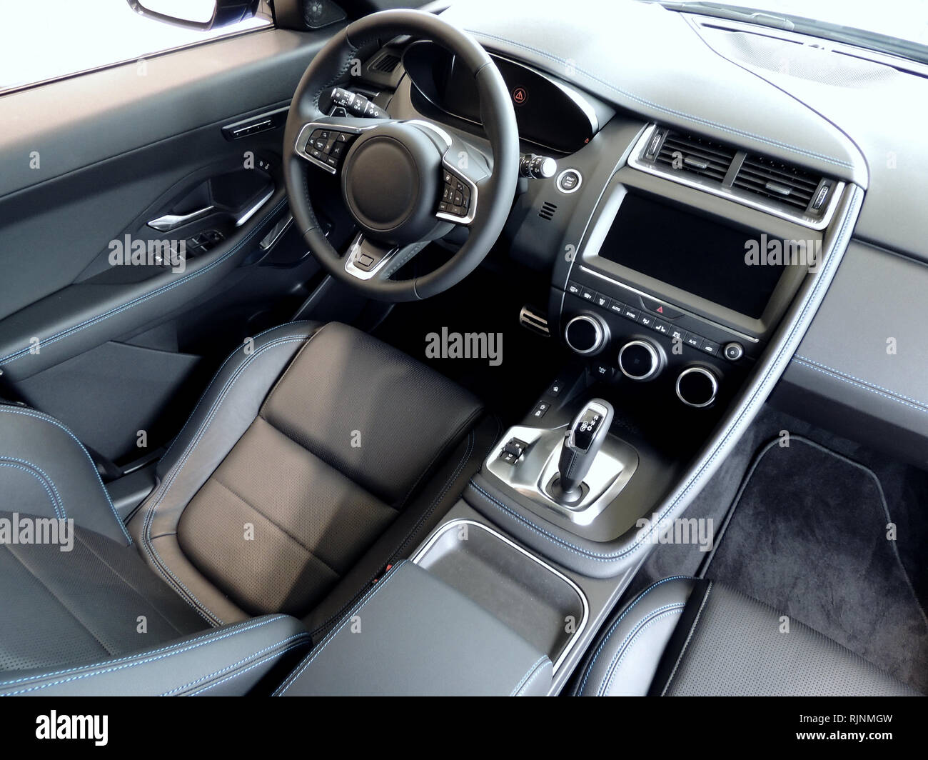 Top view of driver seat in stitched leather car interior Stock Photo - Alamy