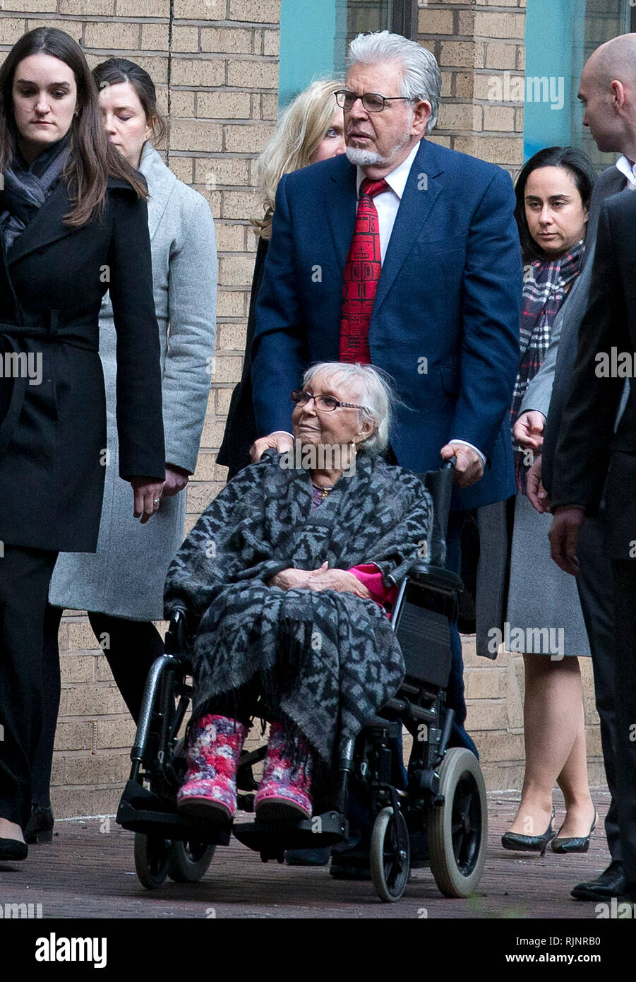 Rolf Harris and his wife Alwen Hughes arrive at Southwark Crown Court on January 14, 2014. Stock Photo