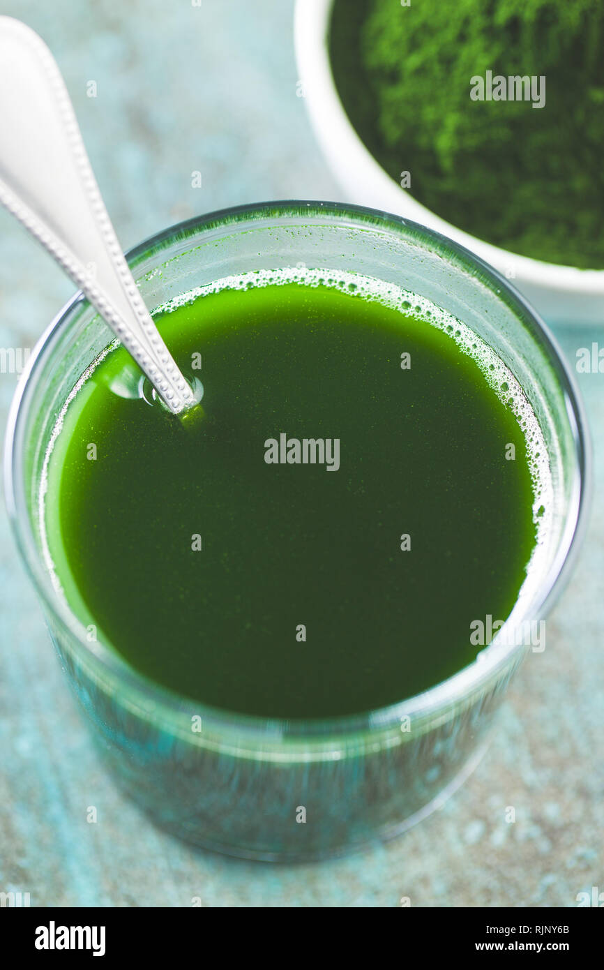 Chlorella or green barley. Detox superfood. Spirulina smoothie Stock
